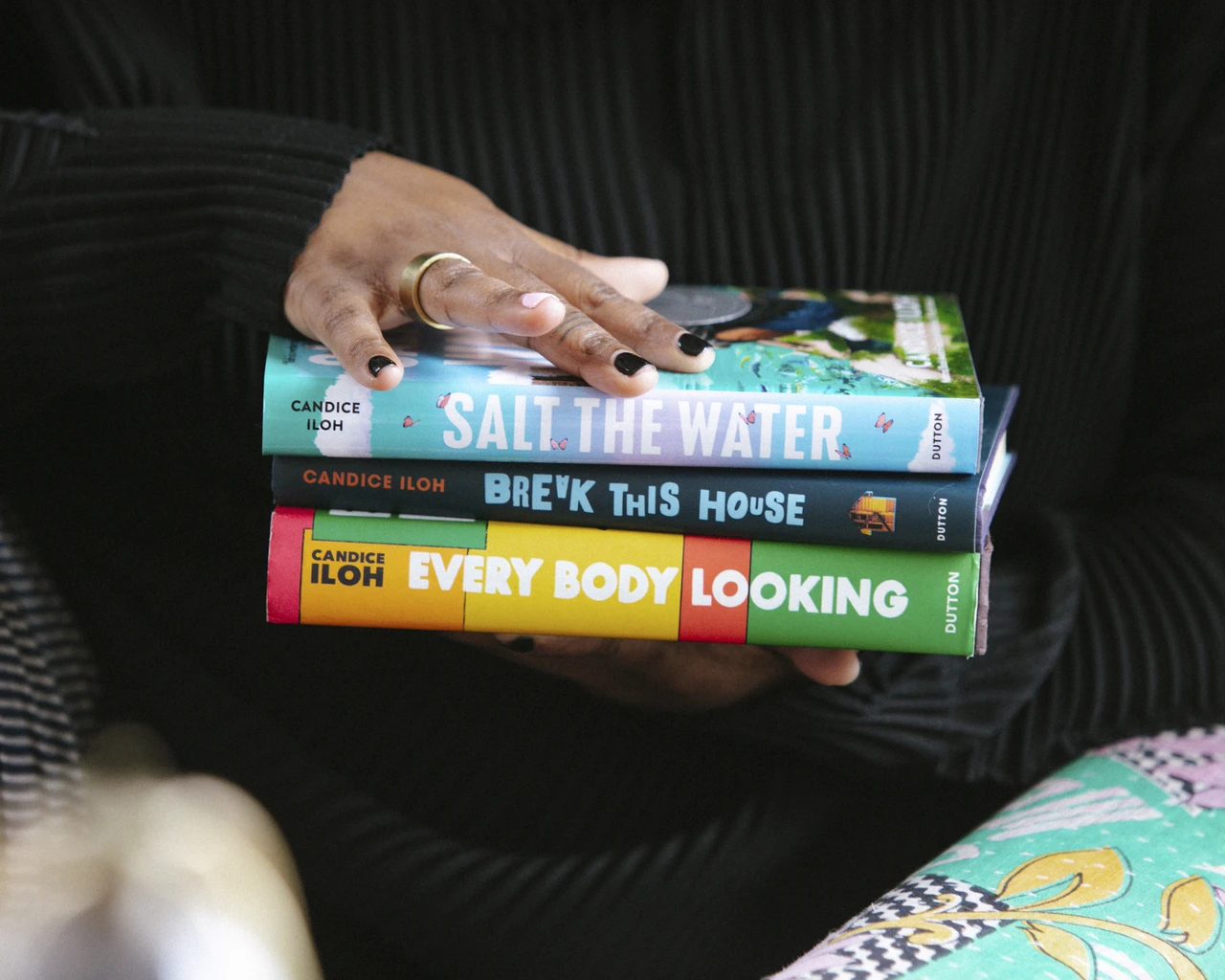 Pew Fellow candice iloh with their three published novels. Photo by Neal Santos.&nbsp;